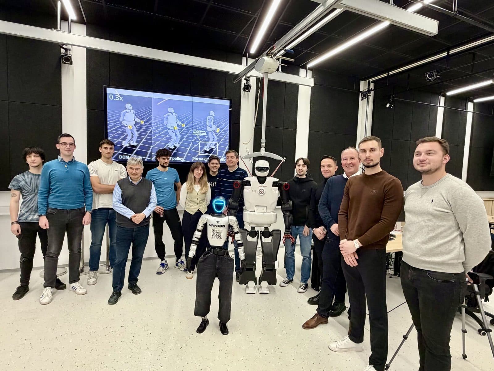 Team and robot · Jožef Stefan Institute