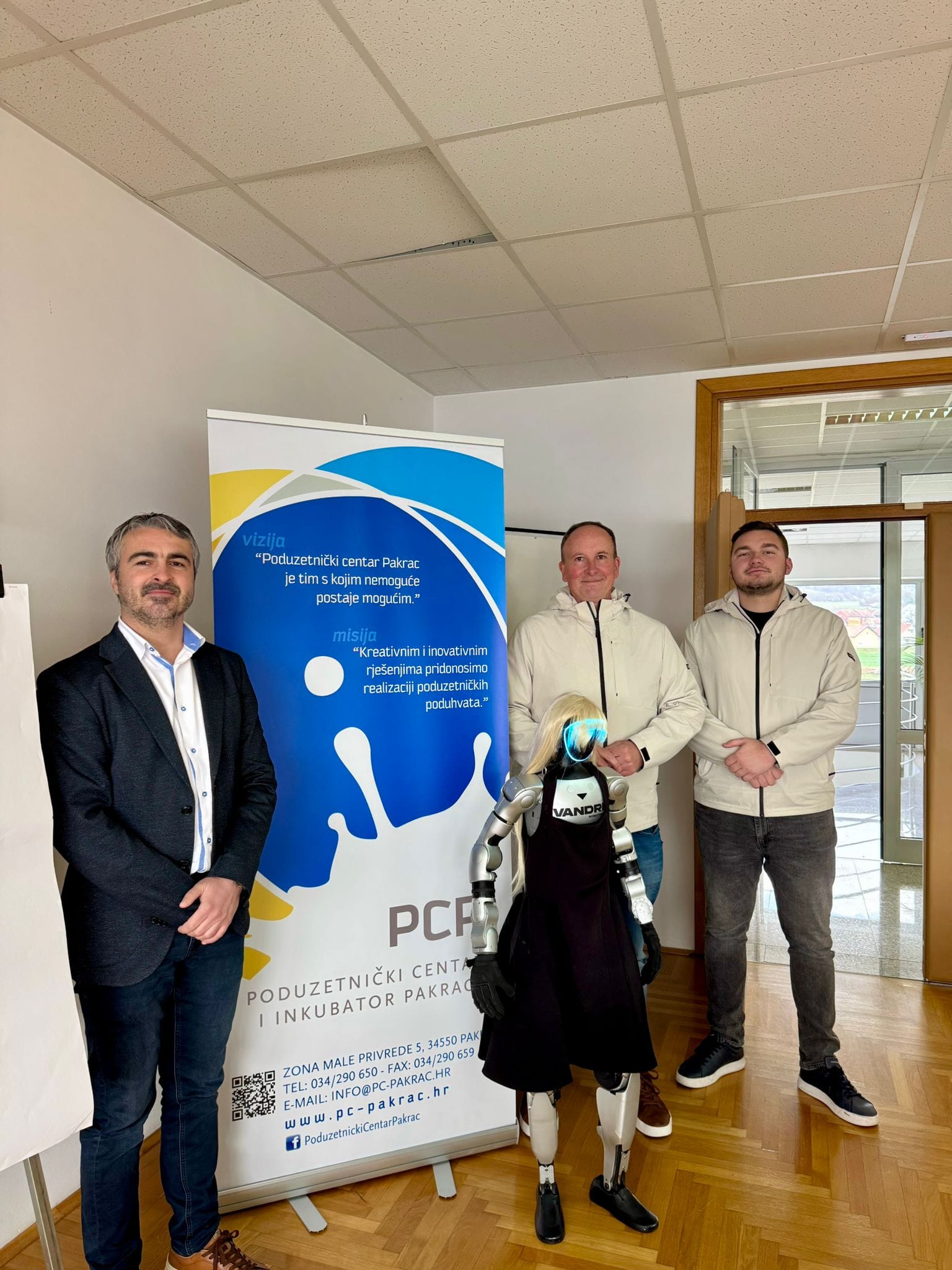 Vandri Robotics team with Tonka at PCP banner