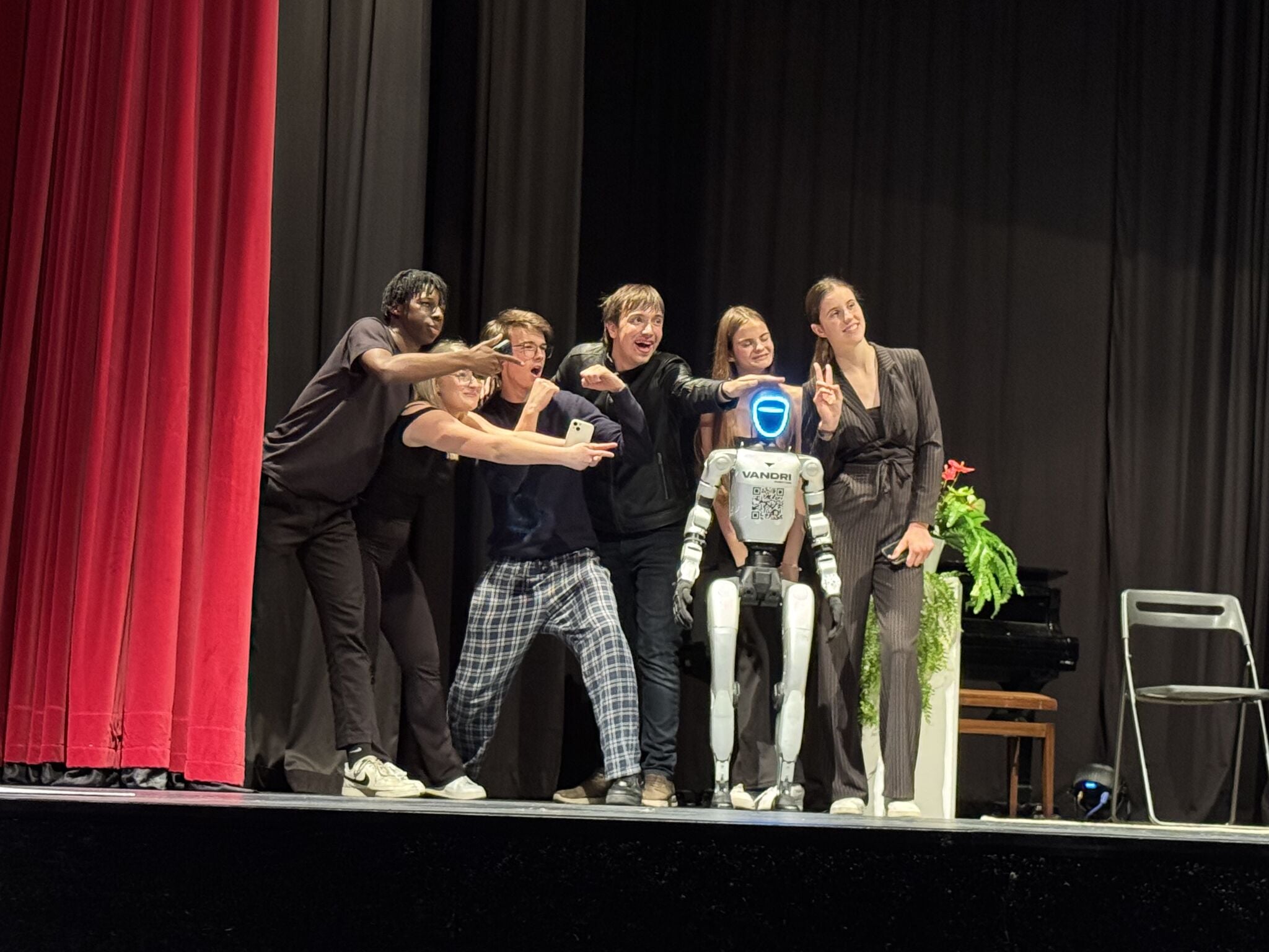 Humanoid robot on stage with human actors at the Cultural Centre in Slovenske Konjice